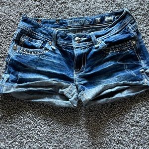 Miss me denim shorts. Distressed. Bling pockets. Low rise. Size 27.